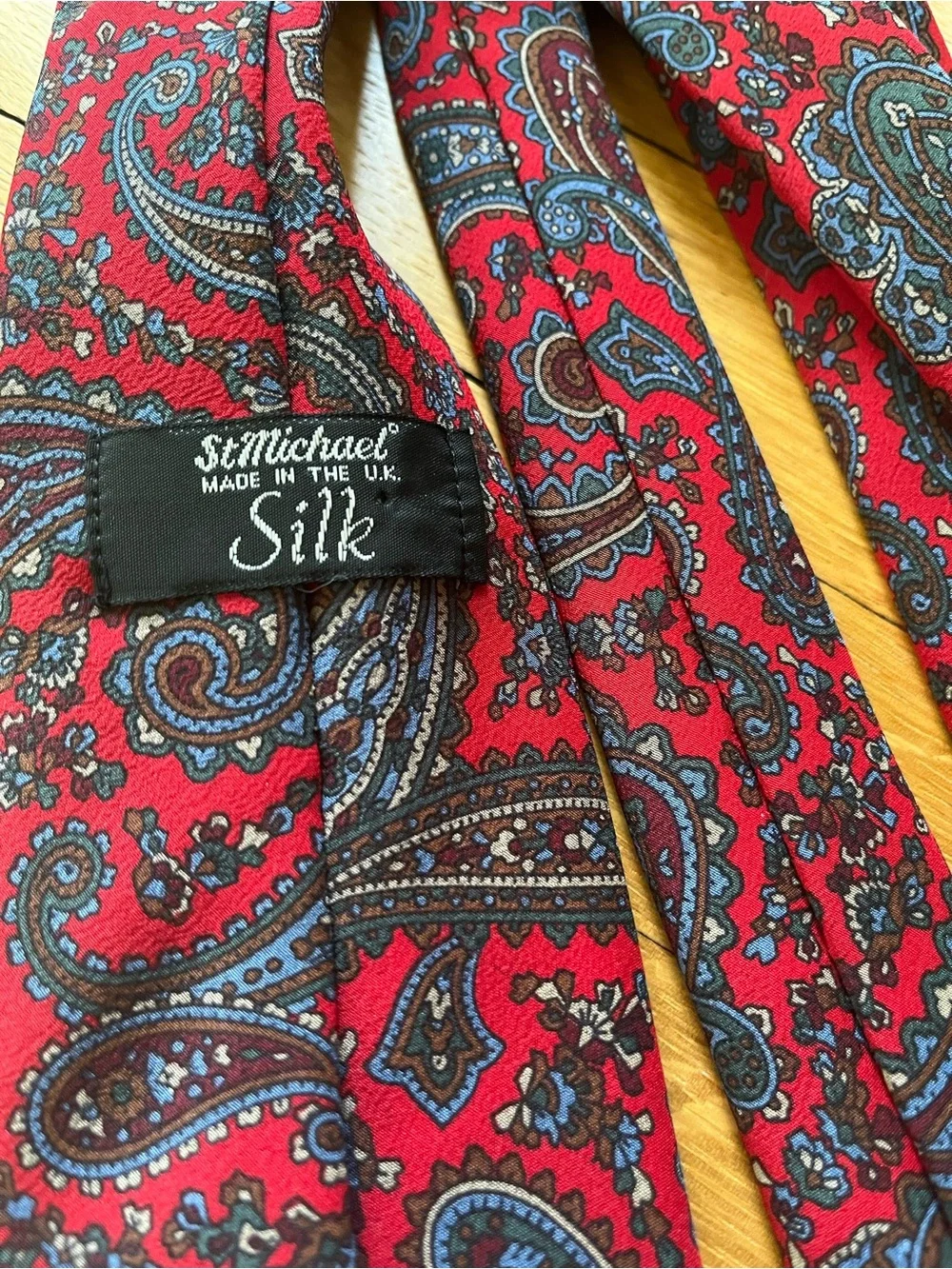 Red Paisley Men's Tie with Blue and Brown Accents